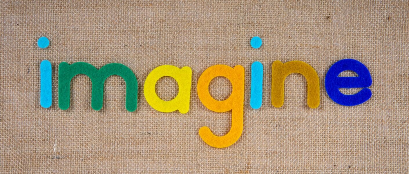 the word imagine on a woven surface